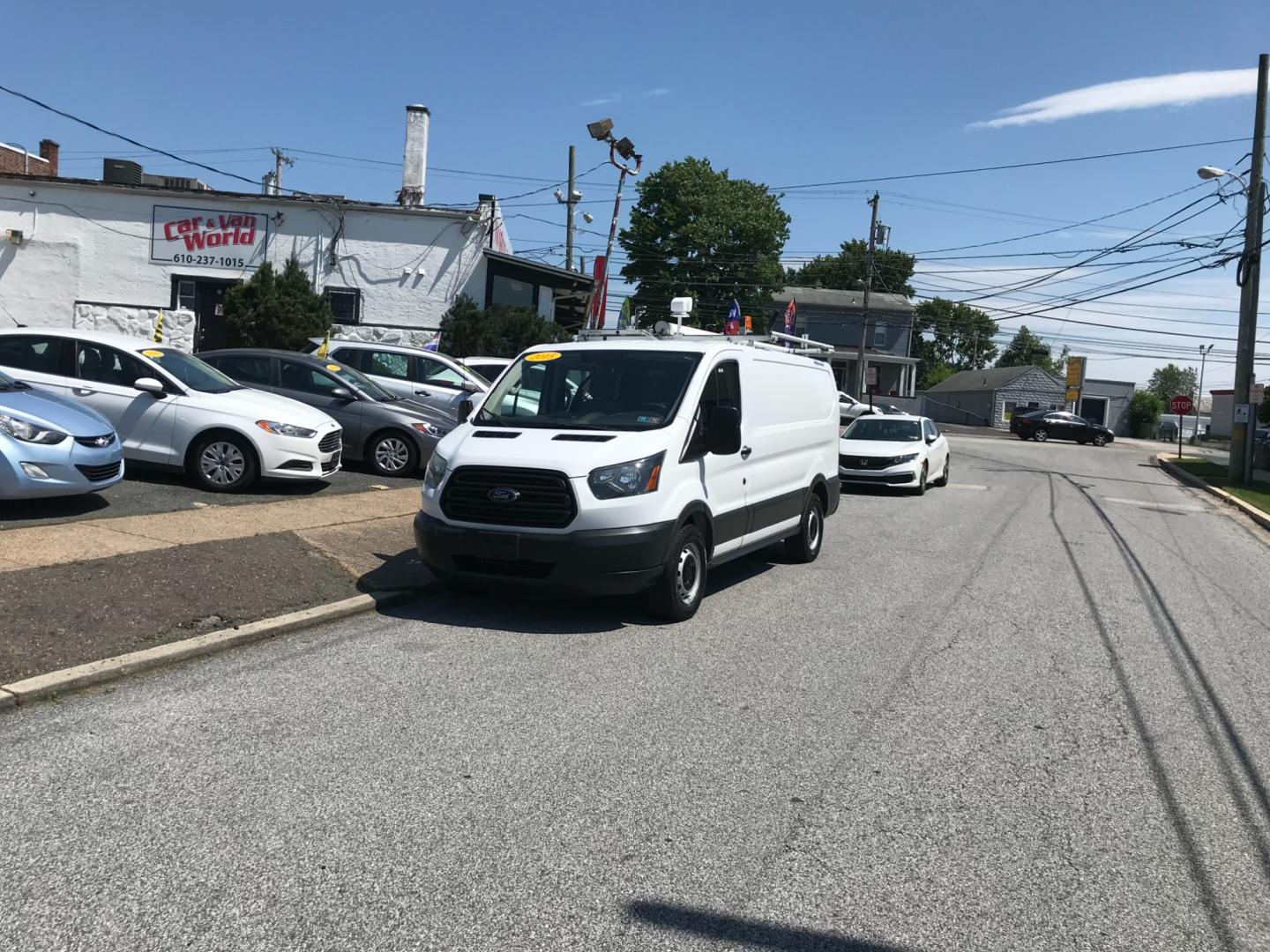 2015 White /Gray Ford Transit 150 (1FTNE1YM9FK) with an 3.7 V6 engine, Automatic transmission, located at 577 Chester Pike, Prospect Park, PA, 19076, (610) 237-1015, 39.886154, -75.302338 - Photo#1